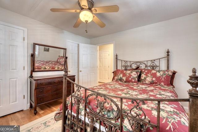 bedroom featuring ceiling fan and wood finished floors