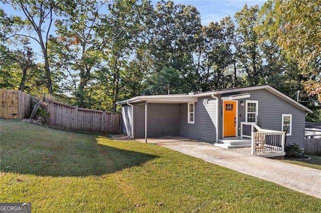 ranch-style house with a front lawn