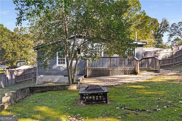 view of yard featuring a deck