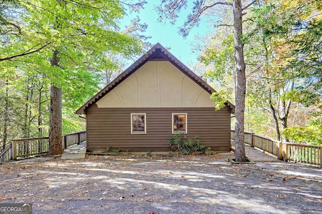 842 Saddleback Cir Unit 36, Sky Valley, GA 30537 - view of side of property featuring a deck