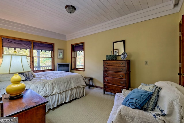 bedroom with light colored carpet and wooden ceiling