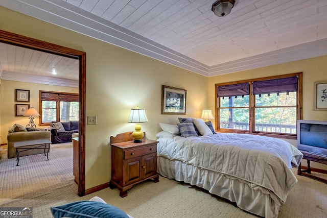 carpeted bedroom with wooden ceiling