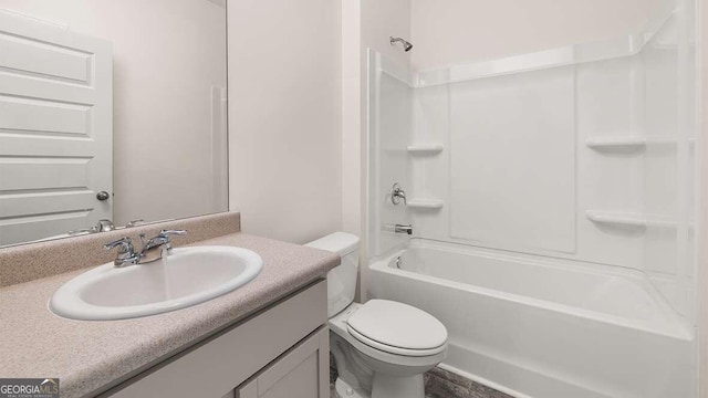 full bathroom featuring vanity, toilet, hardwood / wood-style flooring, and bathing tub / shower combination