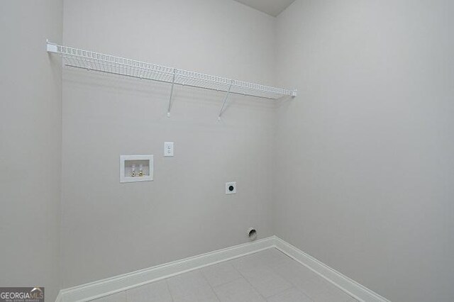 kitchen with stainless steel dishwasher, sink, decorative light fixtures, white cabinets, and a center island