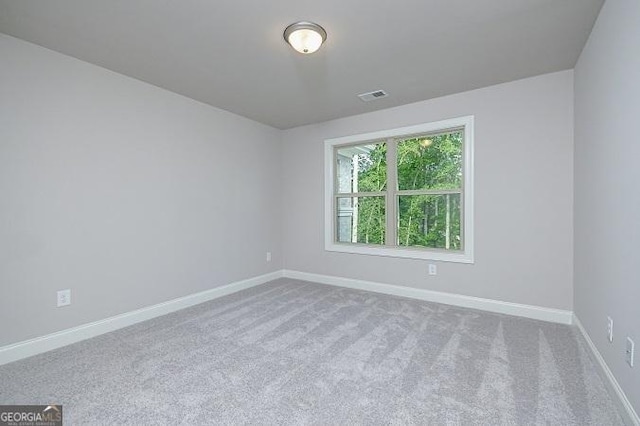 empty room featuring carpet