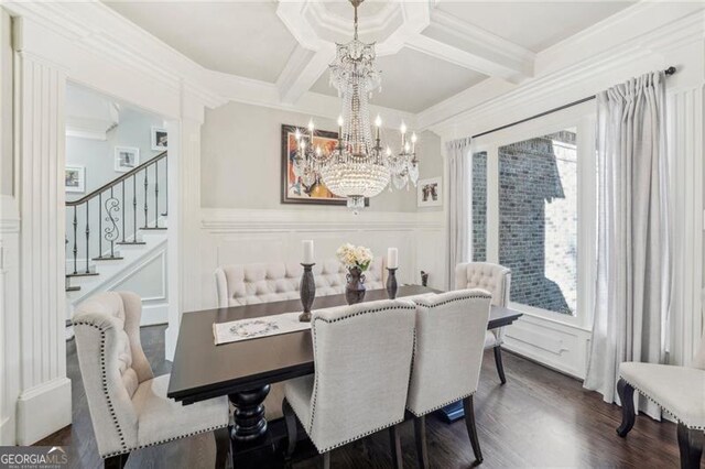 dining room featuring beam ceiling, ornamental molding, dark wood-type flooring, and a notable chandelier