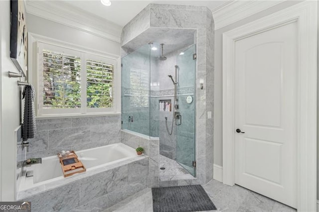 bathroom with crown molding and independent shower and bath