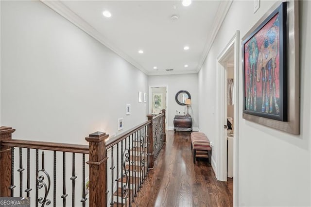 corridor with baseboards, dark wood-style floors, crown molding, an upstairs landing, and recessed lighting