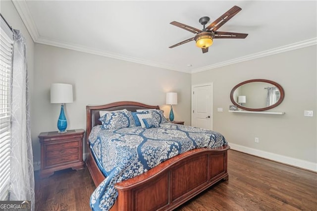 bedroom with ornamental molding, dark wood finished floors, baseboards, and a ceiling fan