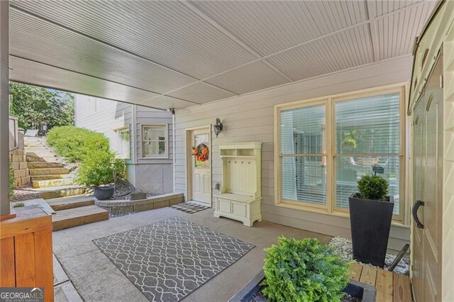 view of patio / terrace featuring an outdoor living space and a deck