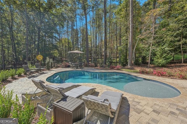 outdoor pool with a patio