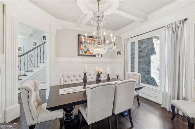 dining space featuring dark hardwood / wood-style flooring, coffered ceiling, beamed ceiling, crown molding, and a chandelier