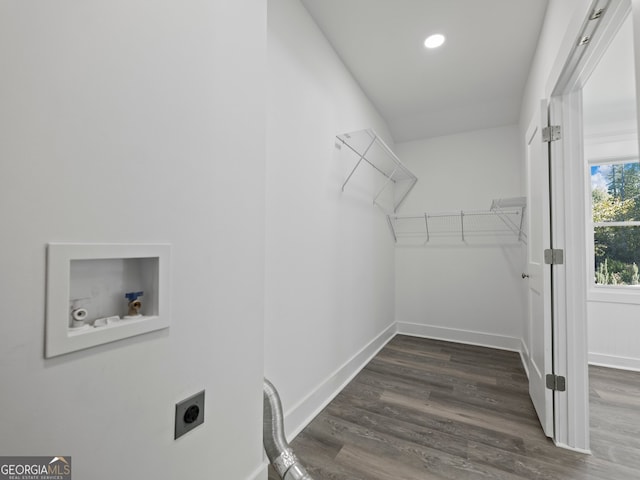 laundry area with dark hardwood / wood-style flooring, washer hookup, and hookup for an electric dryer