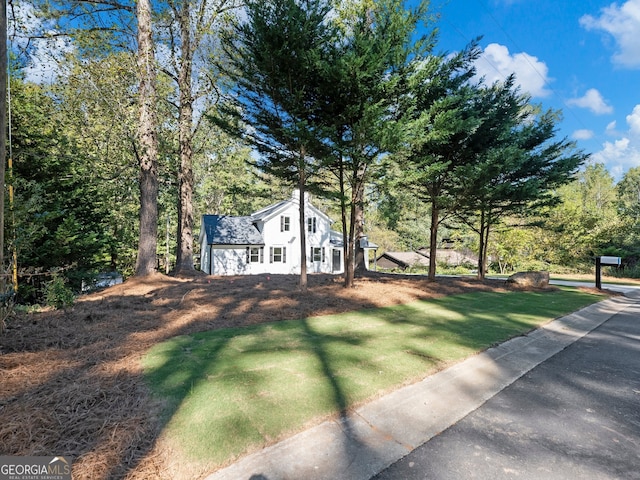 exterior space with a front lawn