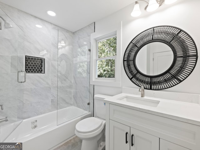 full bathroom featuring vanity, toilet, and enclosed tub / shower combo