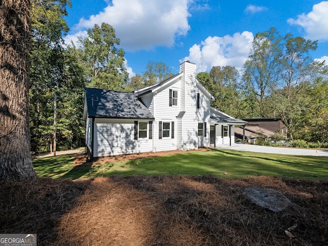 exterior space with a yard