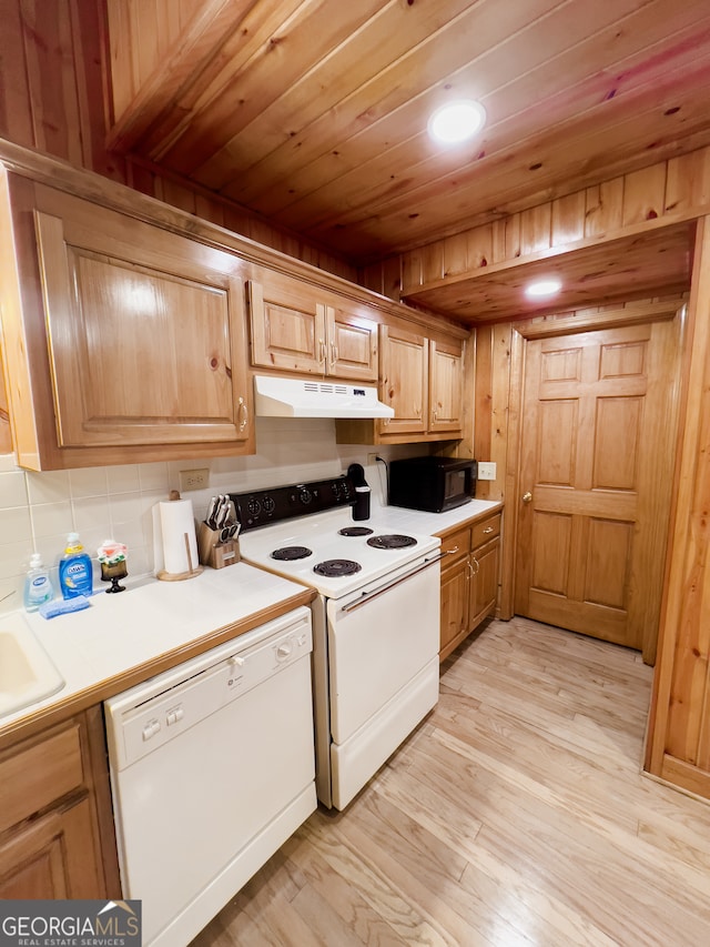 kitchen featuring white appliances, tasteful backsplash, sink, wood ceiling, and light hardwood / wood-style floors