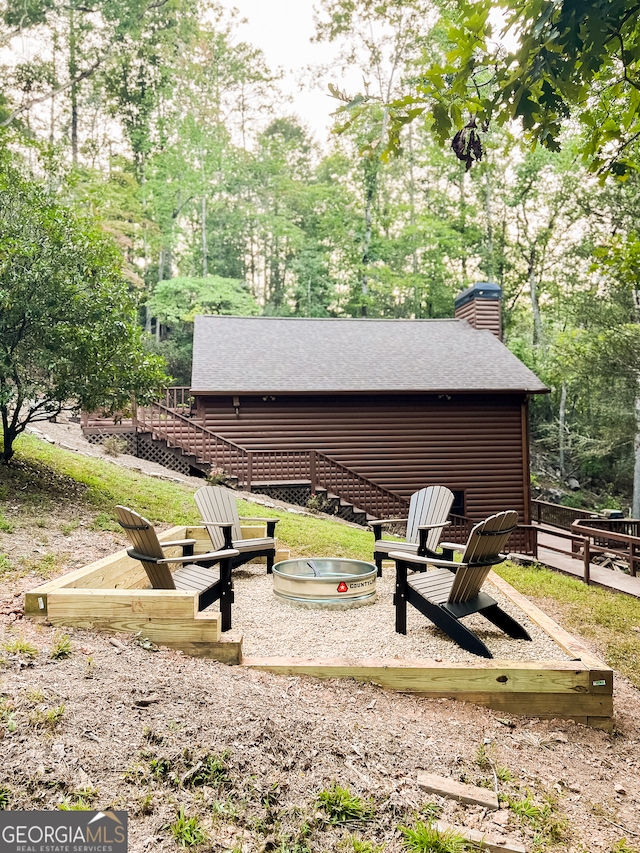 surrounding community featuring a wooden deck