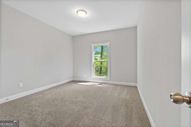 spare room with carpet flooring