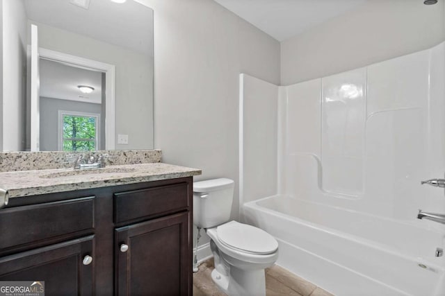 full bathroom with vanity, shower / bathtub combination, and toilet