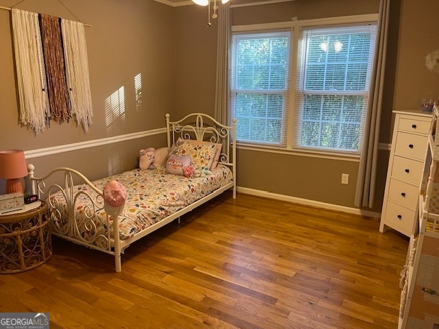 bedroom featuring hardwood / wood-style floors