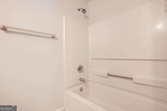 bathroom with shower / bathtub combination