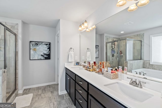 bathroom featuring vanity and plus walk in shower