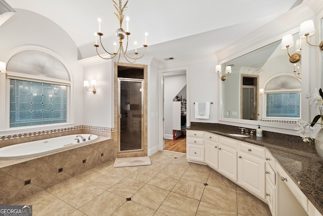 bathroom with shower with separate bathtub, vaulted ceiling, ornamental molding, vanity, and tile patterned floors