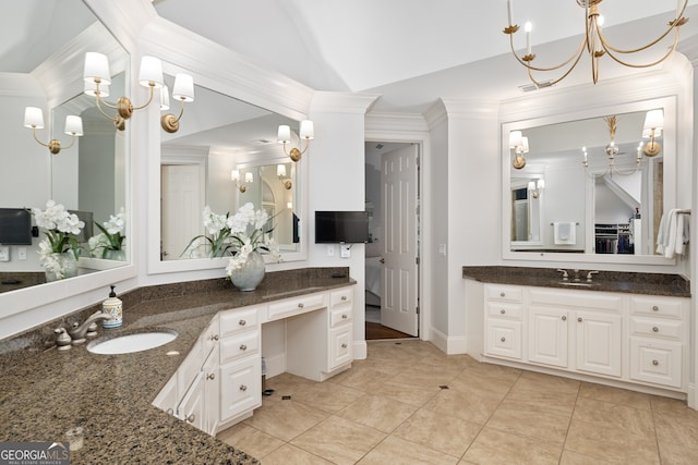 bathroom featuring vanity, crown molding, lofted ceiling, and tile patterned floors