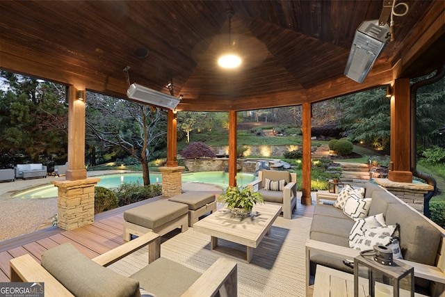 view of patio featuring a pool side deck and outdoor lounge area