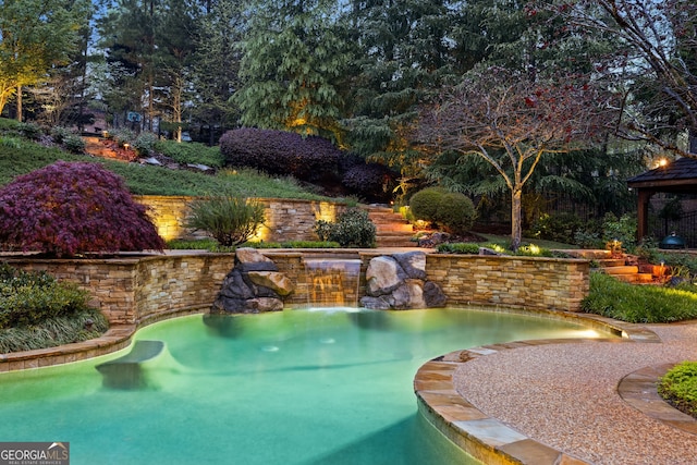 view of pool with a gazebo