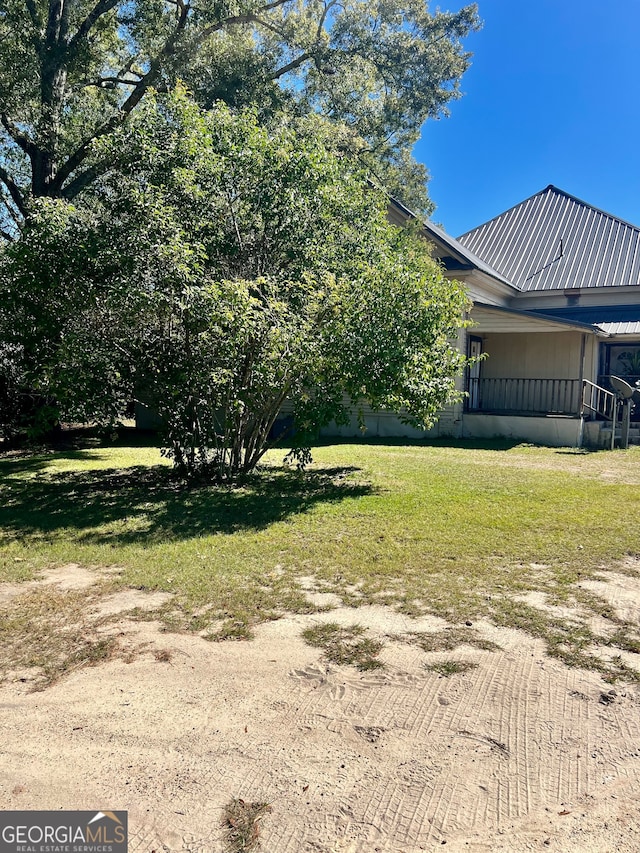 exterior space featuring a yard