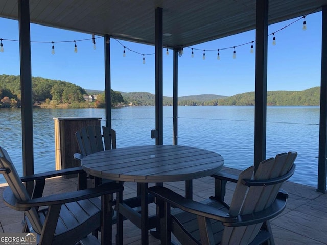 dock area with a water view