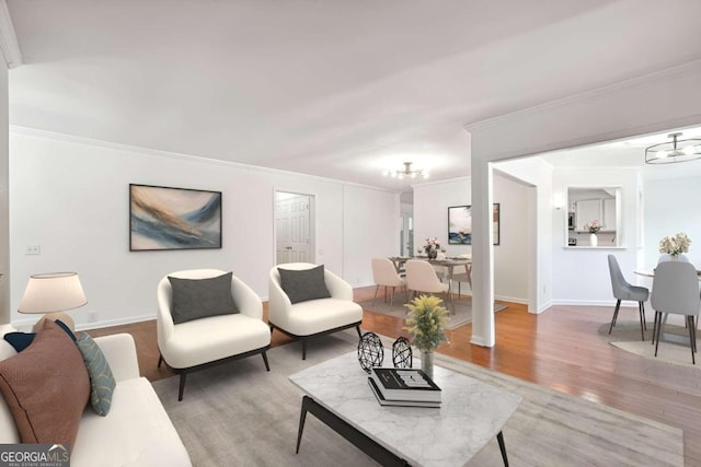 living room with crown molding and wood-type flooring