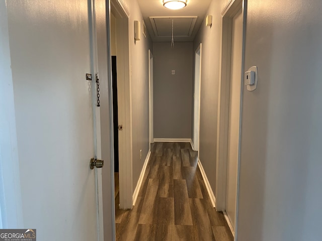 hallway with dark hardwood / wood-style floors