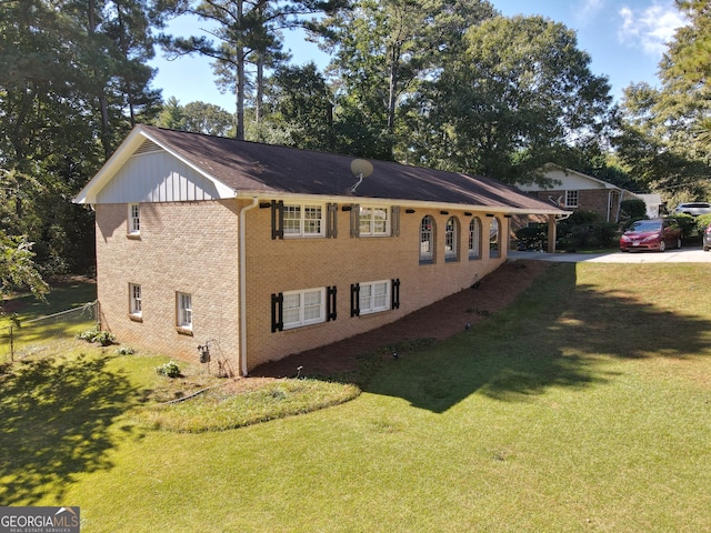 view of property exterior featuring a lawn