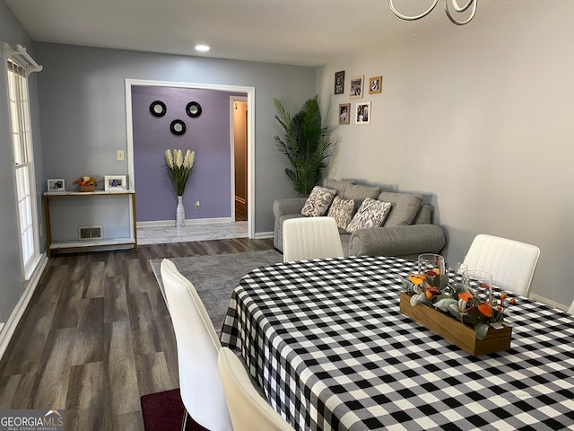 dining room featuring dark hardwood / wood-style floors