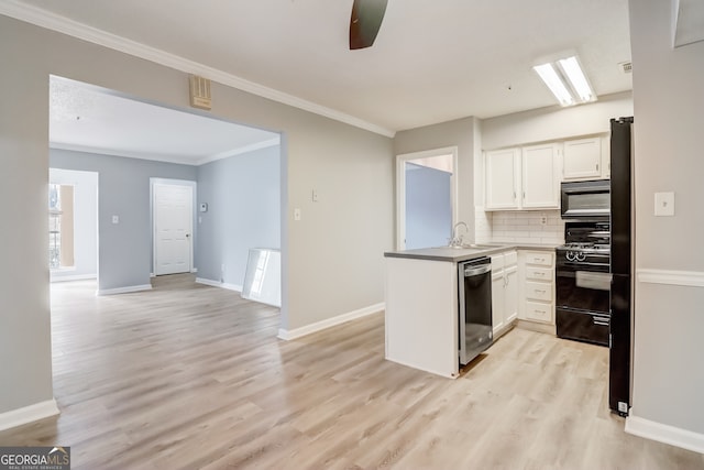 kitchen featuring light hardwood / wood-style flooring, black range, white cabinets, and dishwasher