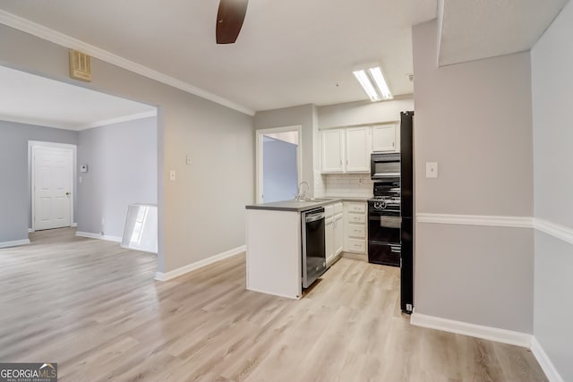 kitchen with kitchen peninsula, tasteful backsplash, white cabinetry, light wood-type flooring, and black appliances