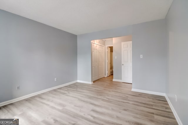 empty room featuring light wood-type flooring