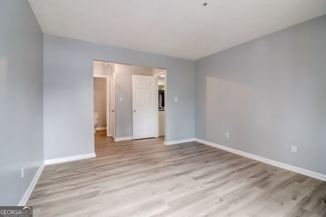 unfurnished room featuring light hardwood / wood-style flooring