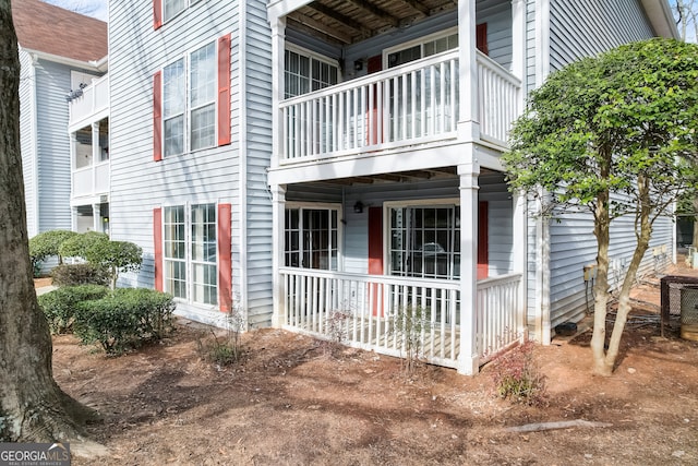 view of home's exterior featuring a balcony