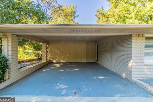 view of vehicle parking featuring a carport