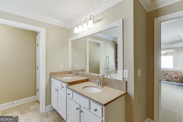 bathroom with a sink, double vanity, and crown molding