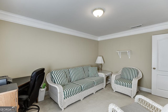 carpeted home office featuring visible vents, crown molding, and baseboards