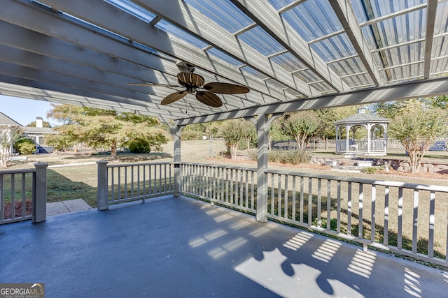 view of patio / terrace featuring ceiling fan and a gazebo