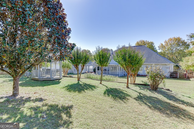 view of yard with a wooden deck