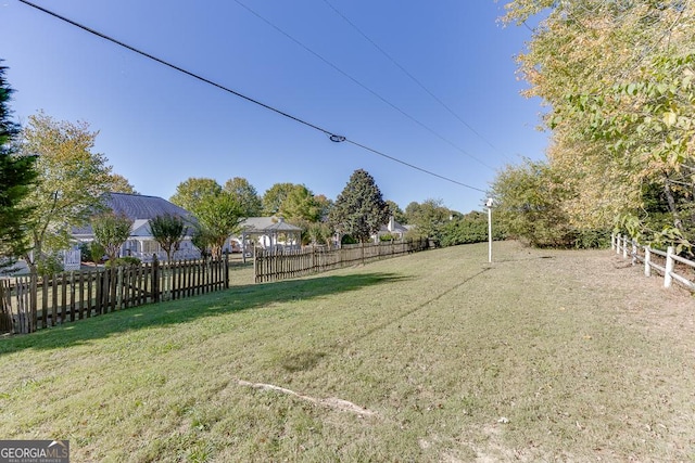 view of yard with fence