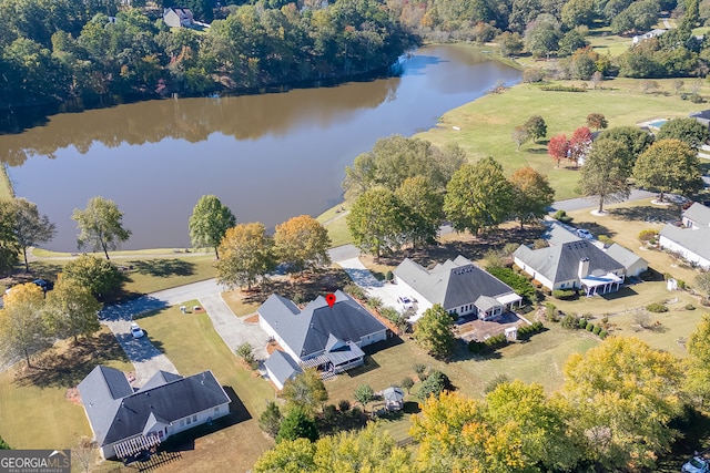 drone / aerial view with a water view