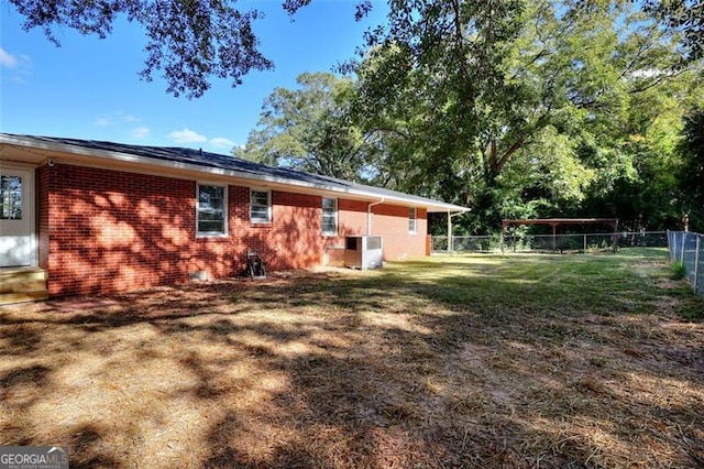 exterior space featuring central AC unit